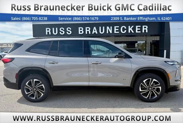 2026 Buick Enclave Sport Touring in Stone Metallic — front three-quarter view