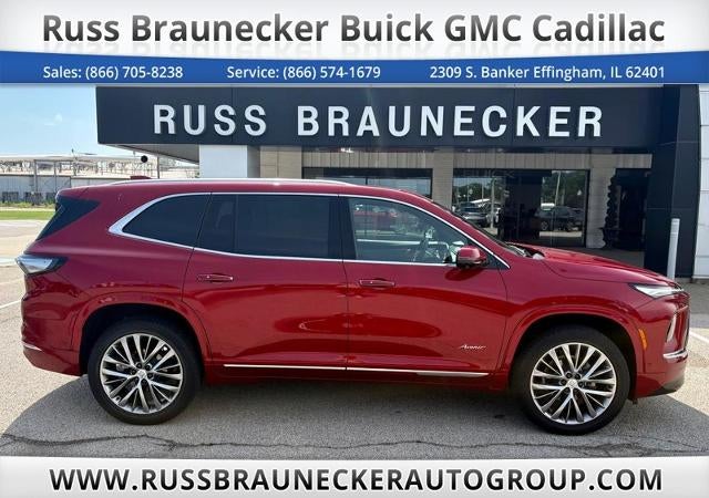 2025 Buick Enclave Avenir in Cherry Red Tintcoat — front three-quarter view